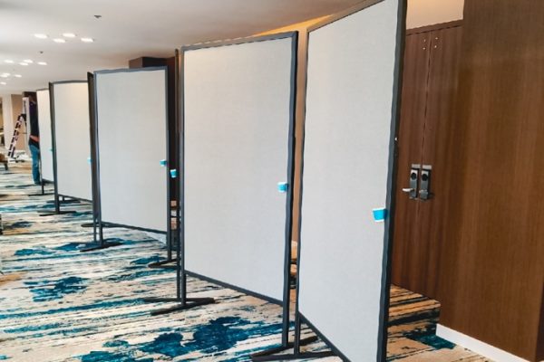 4 by 6-foot vertical poster boards lined up chevron style down the Nikko Ballroom Foyer at Hotel Nikko San Francisco